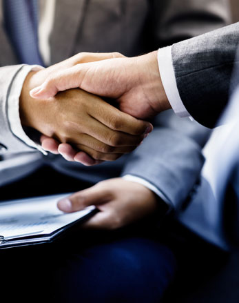 Lawyer and Client Handshake